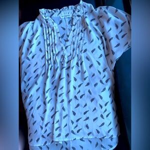 Mod Boutique brand white blouse with feather pattern